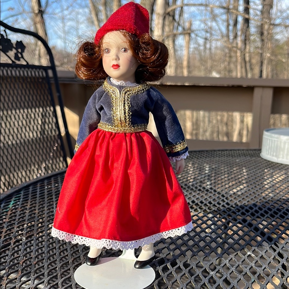 Red and Blue Porcelain Doll